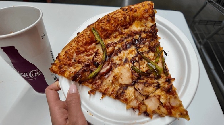 Close-up of a slice of Costco BBQ chicken pizza in France