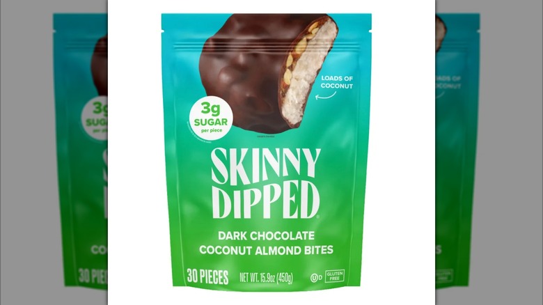 Skinny Dipped Dark Chocolate Coconut Almond Bites on white background