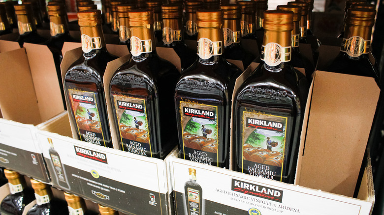 bottles of Costco's Kirkland Balsamic Vinegar of Modena on shelf