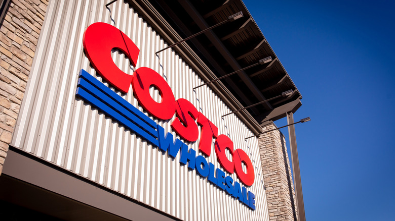 The main Costco sign that hangs over the exterior entrance to the store