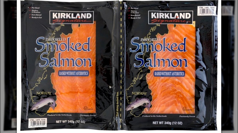 Two side-by-side packages of Kirkland Signature Smoked Salmon against a white background.