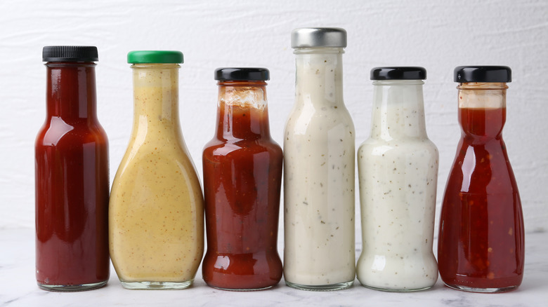 Salad dressing bottles on a countertop