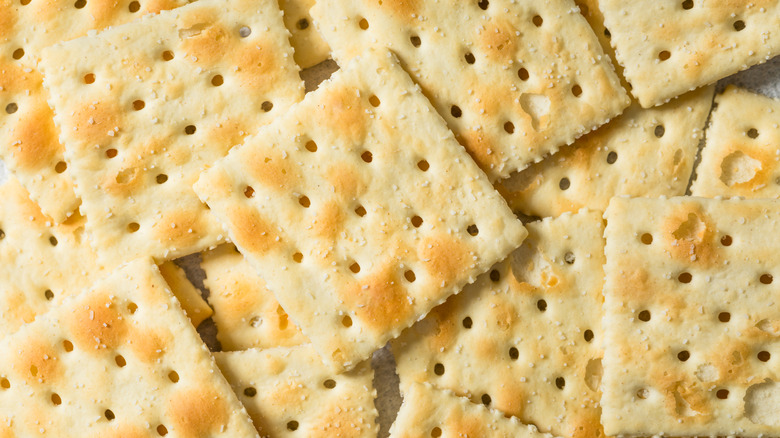 Close-up on a pile of saltine soda crackers