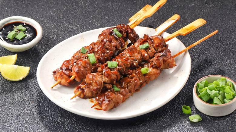 Japanese meal with sauces and chicken