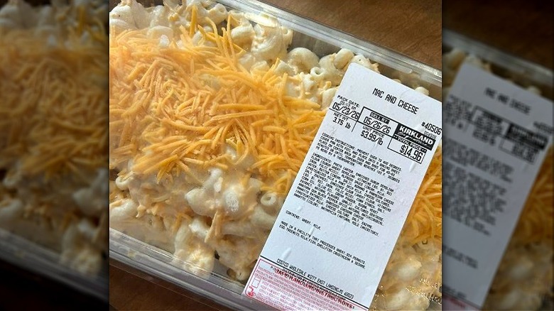 A close-up of a tray of Kirkland Signature Mac and Cheese in its packaging