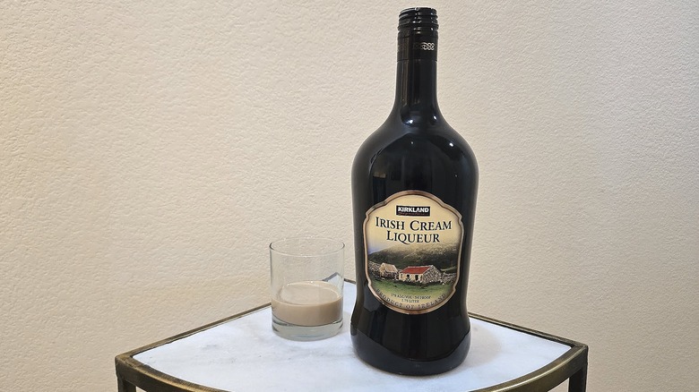 Bottle of Kirkland Signature Irish Cream Liqueur with glass