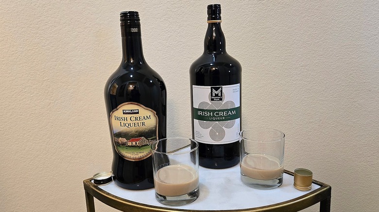Bottles of Irish Cream from Costco and Sam's Club with glasses