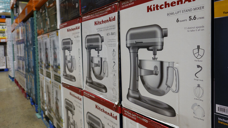 Selection of silver KitchenAid 6-quart mixers on the shelves at Costco