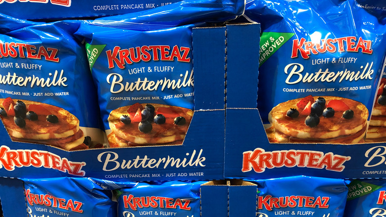 Krusteaz Buttermilk pancake mix packages in a Costco Warehouse store