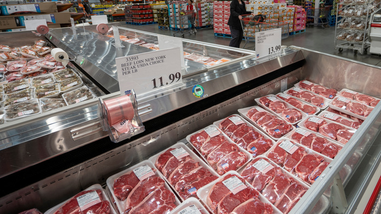 Reach-in coolers full of beef at a Costco Warehouse.