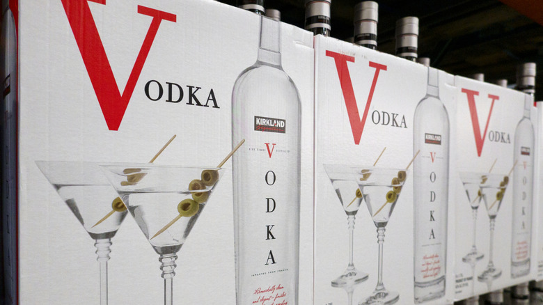Boxes of Costco French vodka stacked atop one another