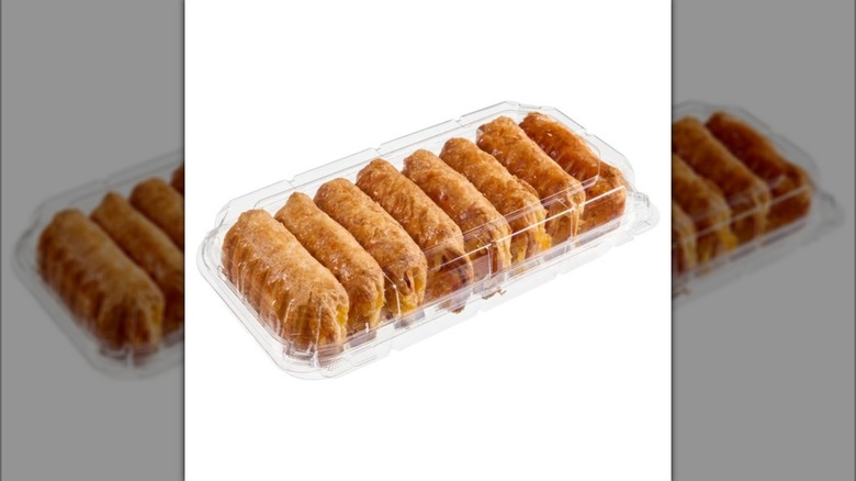 Plastic box of Kirkland Signature Peaches and Cream Pastries on white background