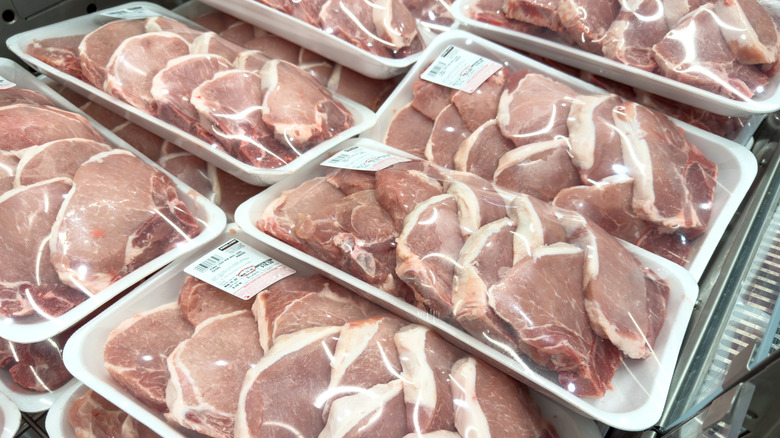 a display of raw meat at Costco