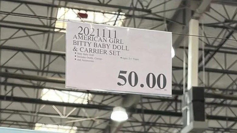 Costco price tag for American Girl Bitty Baby doll & carrier set for $50.00