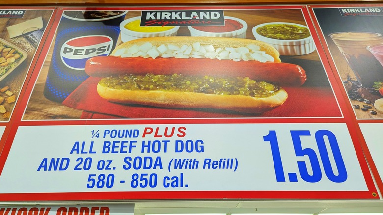 Costco menu board advertising 1/4 pound plus hot dog and soda for $1.50