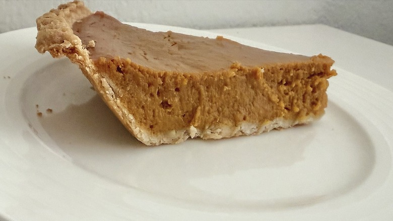 A side view of a piece of Costco pumpkin pie