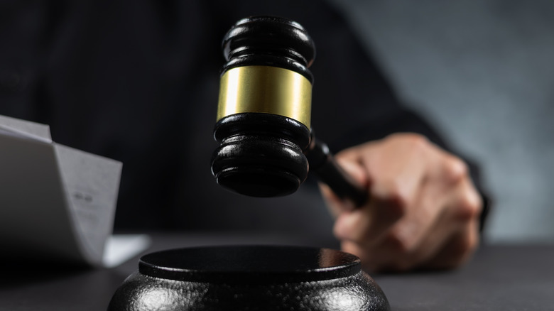 A judge bangs a gavel