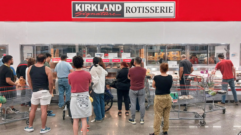 A crowd of shoppers waiting to buy Costco rotisserie chickens