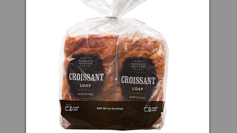 Product image of two croissant loaves in plastic packaging.
