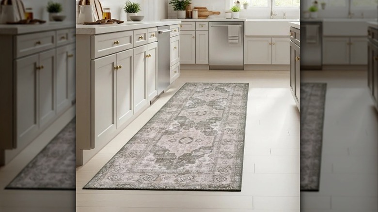 Donati vintage runner rug in a modern kitchen, dove gray cabinets, stainless steel appliances, and white sink.