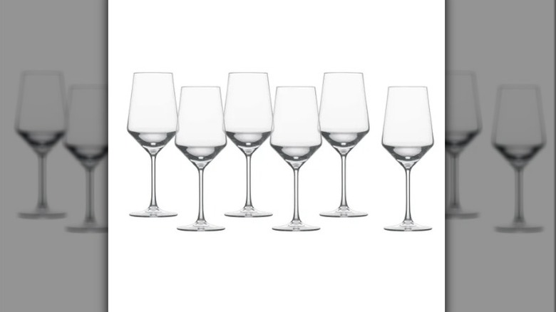 A six-piece set of Zwiesel Pure red wine glasses on a white blackground.