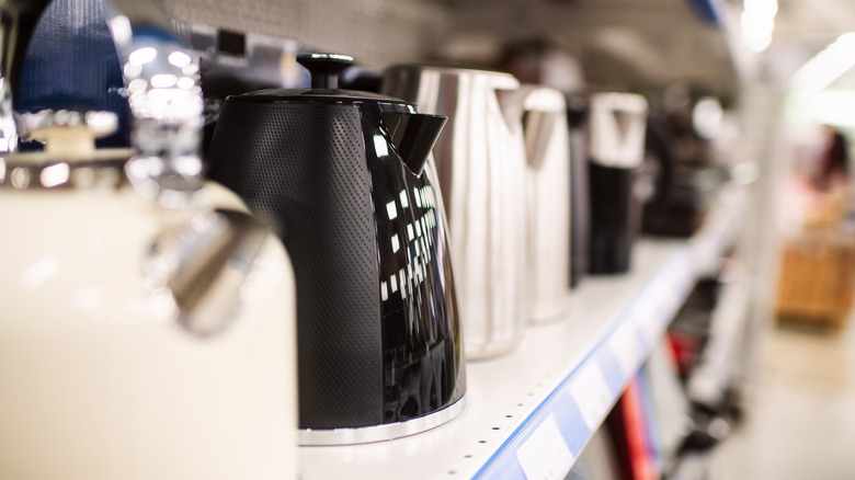Kettles on shelf