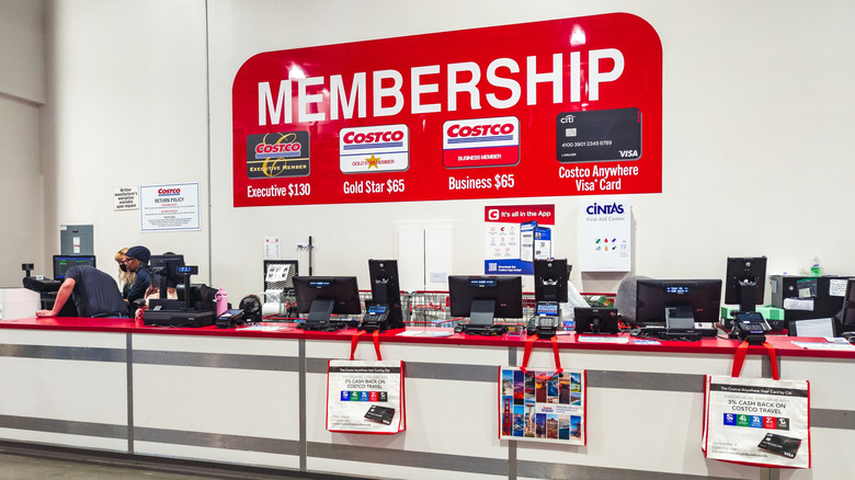 A membership counter inside a Costco store.