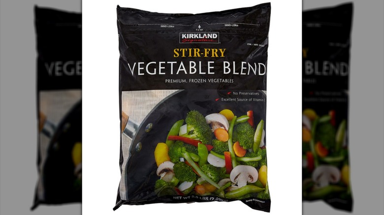 Black bag of Kirkland Signature Stir-Fry Vegetable Blend on white background