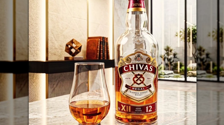 Bottle of Chivas 12 year old Blended Scotch Whiskey and Glencairn glass