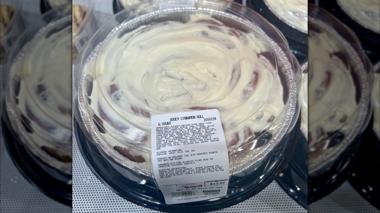 A display of Kirkland Signature Gooey Cinnamon Rolls in a Costco warehouse
