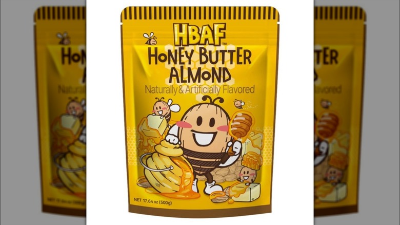 Yellow bag of HBAF Honey Butter Almonds with honey bee mascot