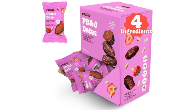A pink box of individually-wrapped pouches of Realsy PB & J Dates