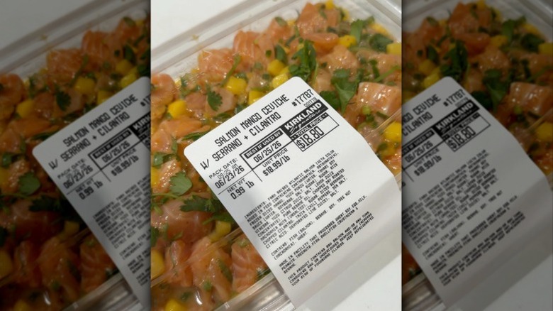 A container of Salmon Mango Ceviche with Serrano and Cilantro