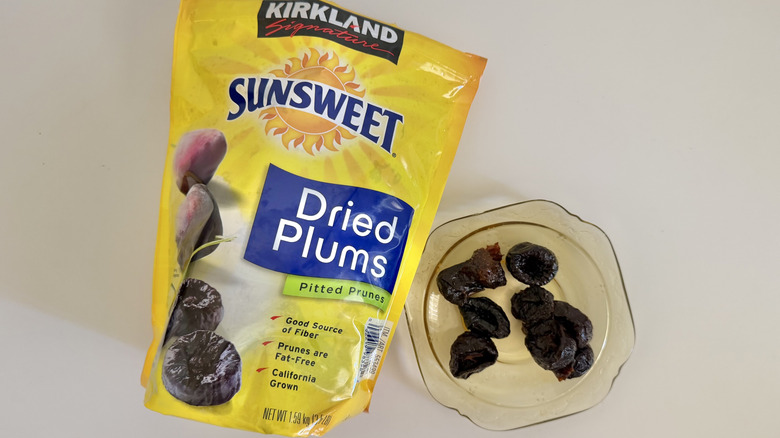 Kirkland Sun suite plums on a small yellow plate
