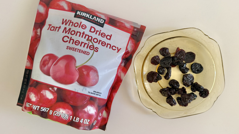 Several pieces of dried cherries on a plate