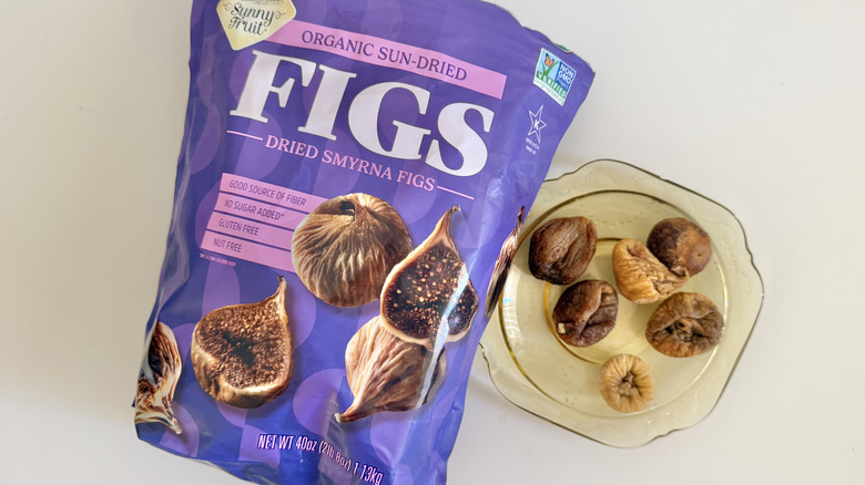 Several dried figs on a plate