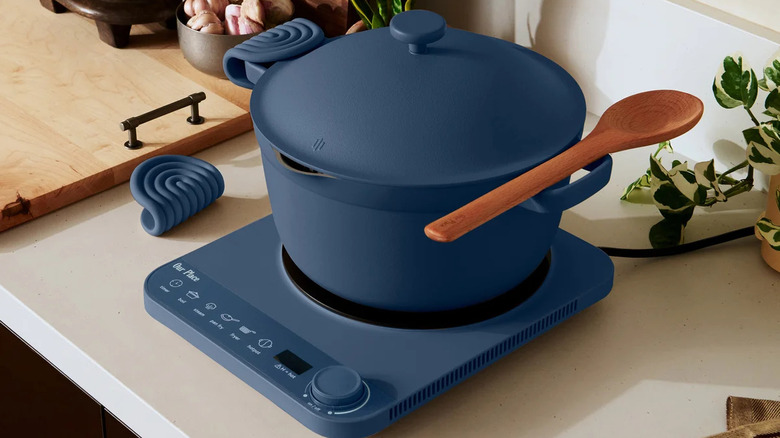 Our Place Induction Plate and Perfect Pot with Hot Grips on kitchen counter