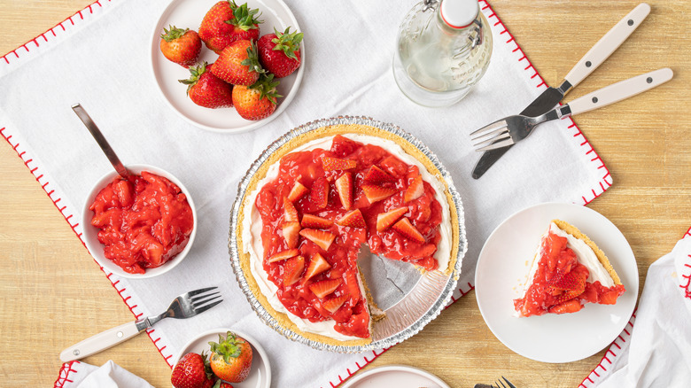 aerial shot of strawberry cream pie served on table