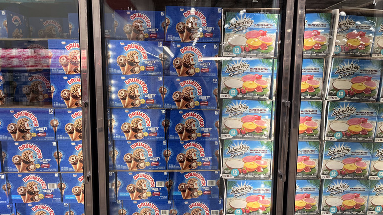 Ice cream freezer at Costco with boxes of two brands visible