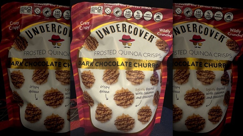 A bag of Undercover Dark Chocolate Churro Minis Chocolate Quinoa Crisps