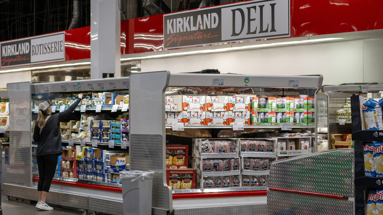 Costco store's deli with woman shopping