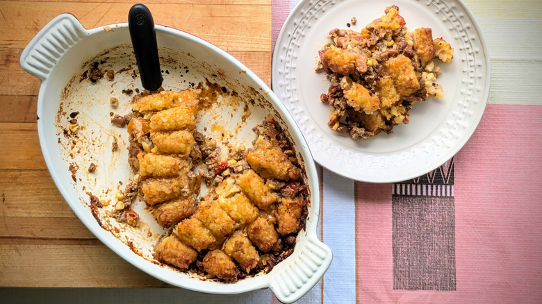 Pan and plate of tater tot casserole