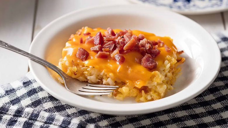 Cracker Barrel hashbrown casserole in plate with fork