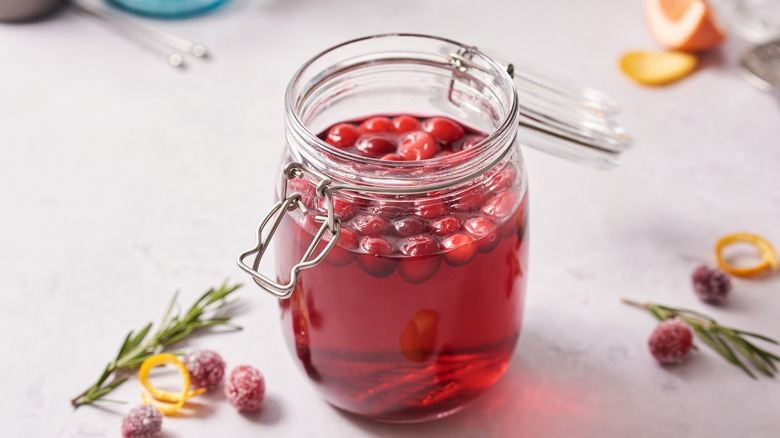 jar of cranberry vodka