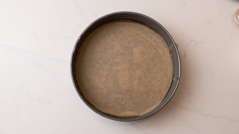 greased and lined cake tin