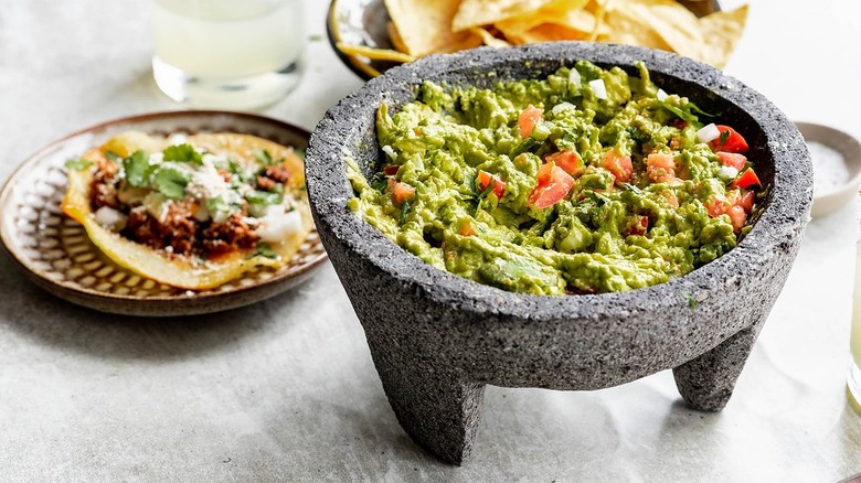 guacamole with chopped tomatoes