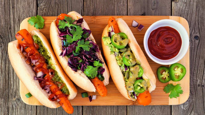 carrot vegan hot dogs with assorted toppings