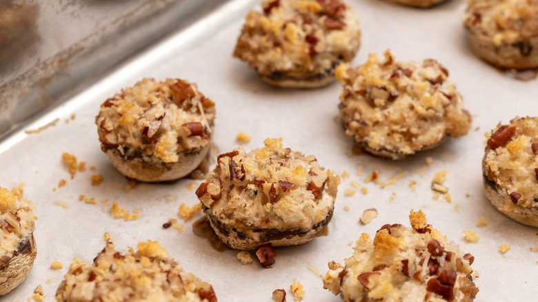 cream cheese-stuffed mushrooms on serving platter