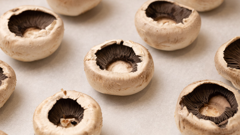 mushroom caps on baking tray