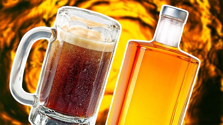 bottle of whiskey and mug of cream soda